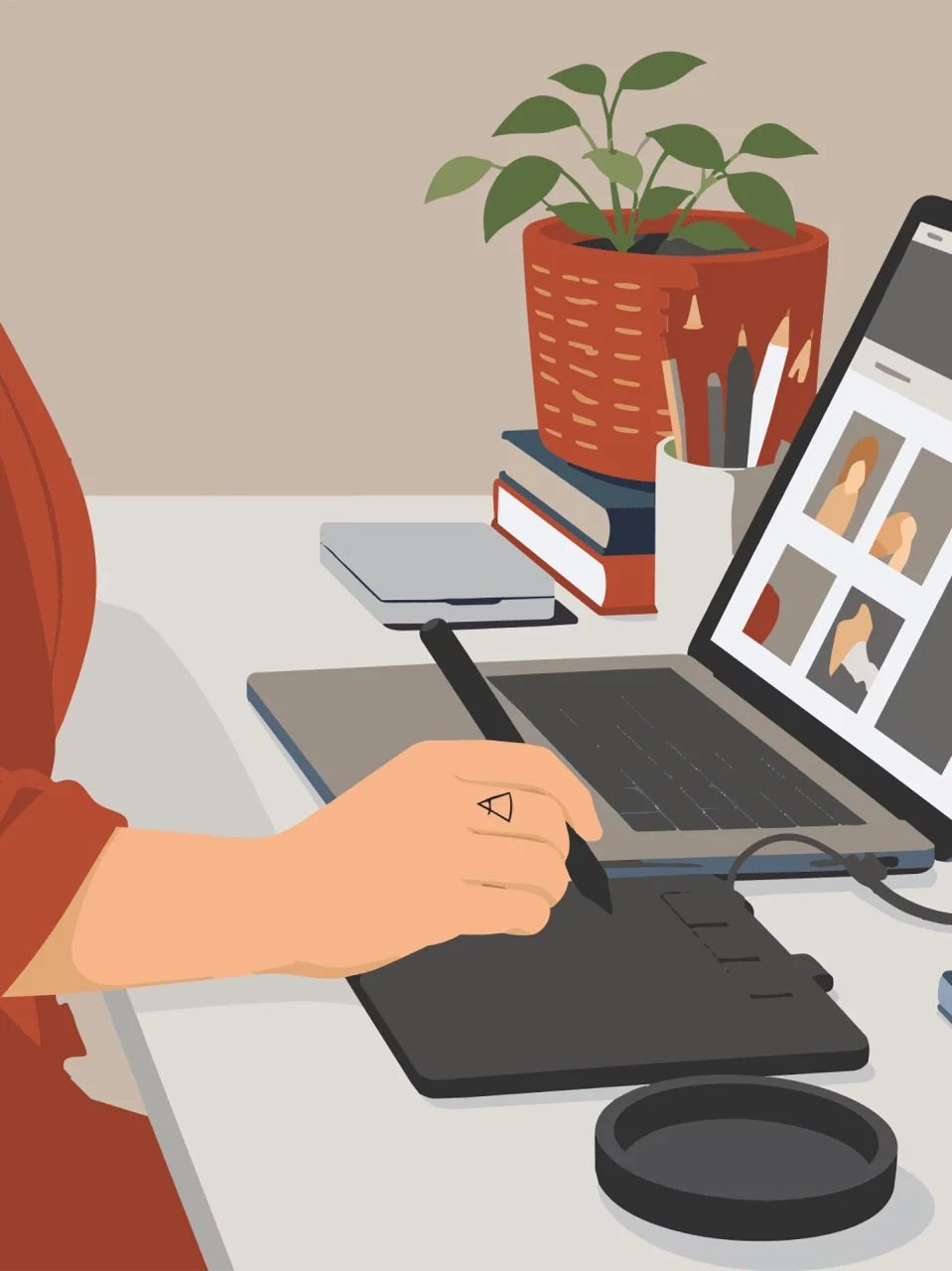 Graphic designer al lavoro su tavoletta grafica per la progettazione grafica.